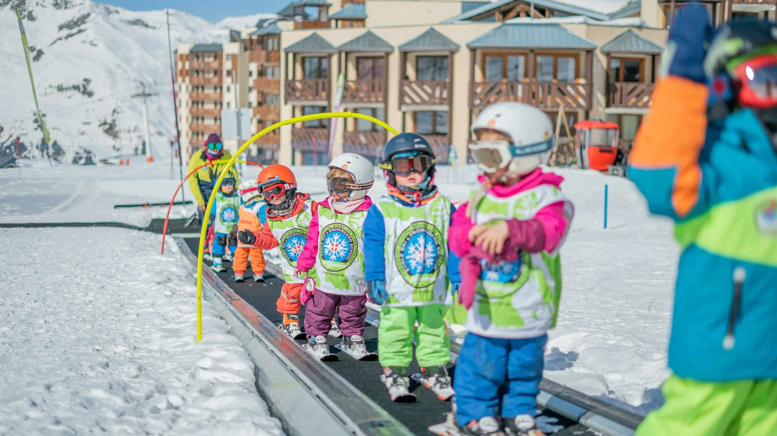 3-year-old-child-skiing-childrens-ski-area-val-thorens 3-year-old-child-skiing-childrens-ski-area-val-thorens