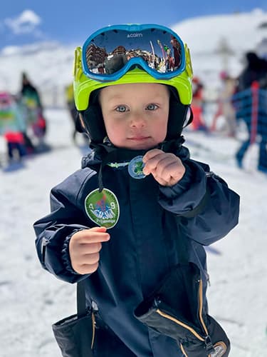 3-year-old-child-skiing-childrens-ski-area-val-thorens 3-year-old-child-skiing-childrens-ski-area-val-thorens